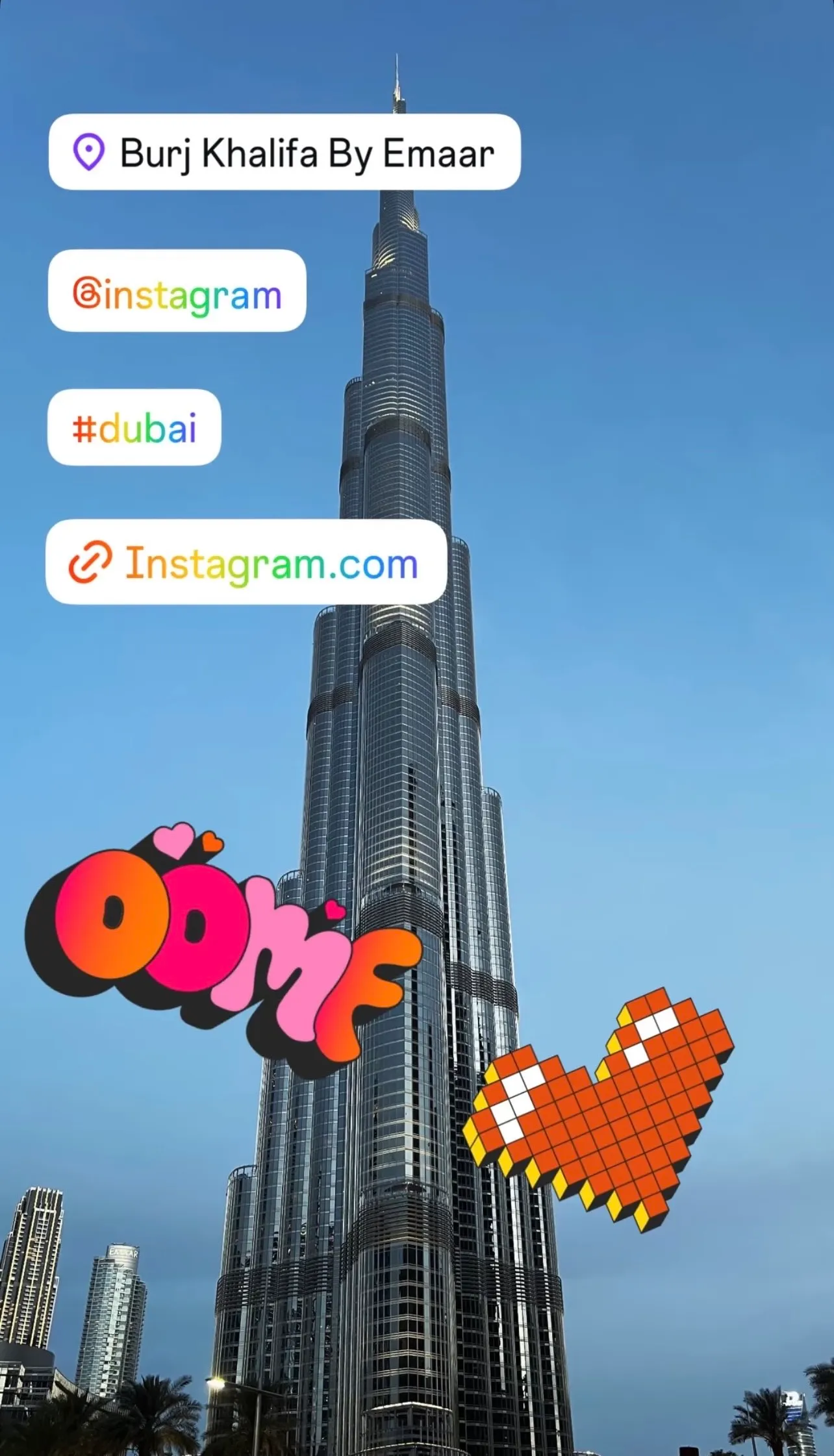 Instagram Story with geolocation, mention, hashtag, and link stickers over a skyscraper photo